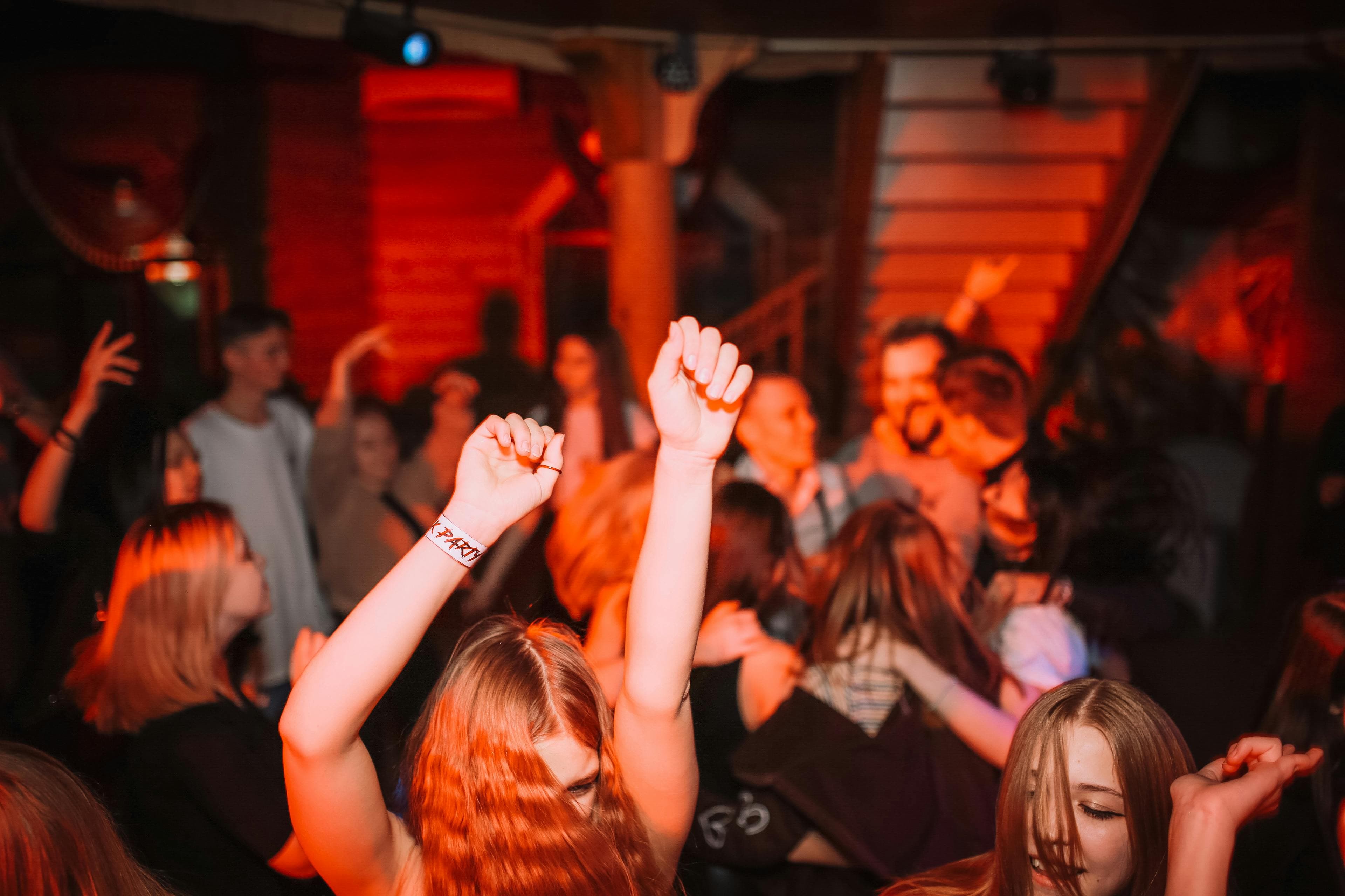 Vibrant crowd enjoying electronic music event